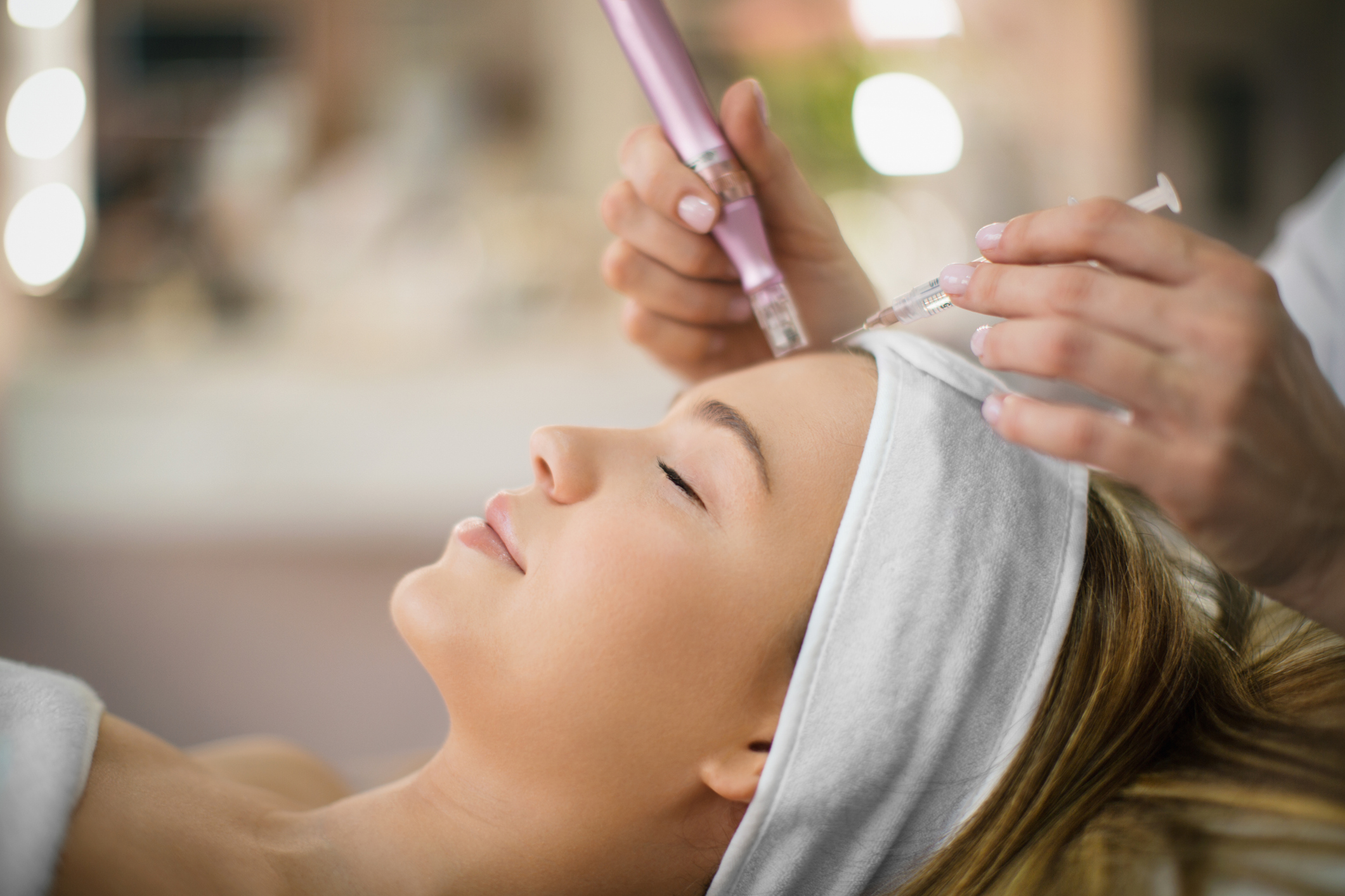 Enjoying facial treatment in a beauty salon.